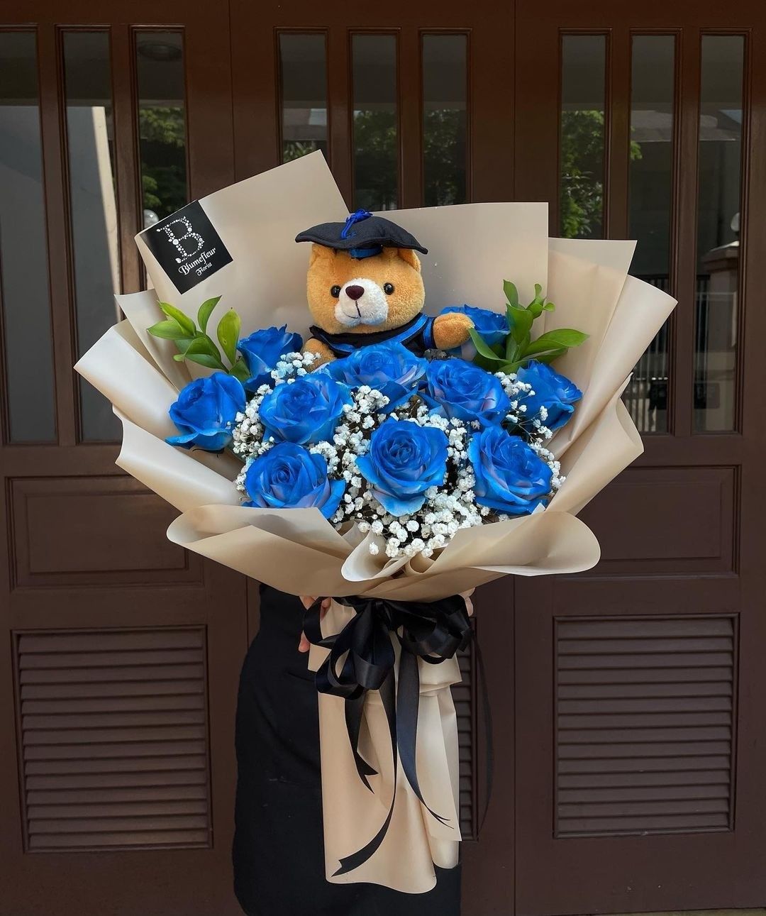 Bouquet Graduado en 12 Rosas Azules